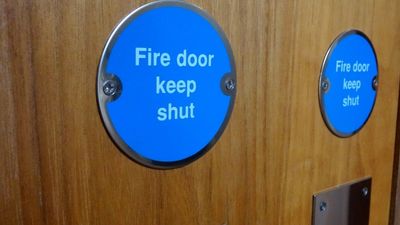Fire Safety Door with a badge Fire door Keep Shut