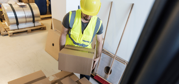 Man lifting a box.