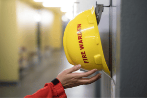 Fire warden yellow helmet.