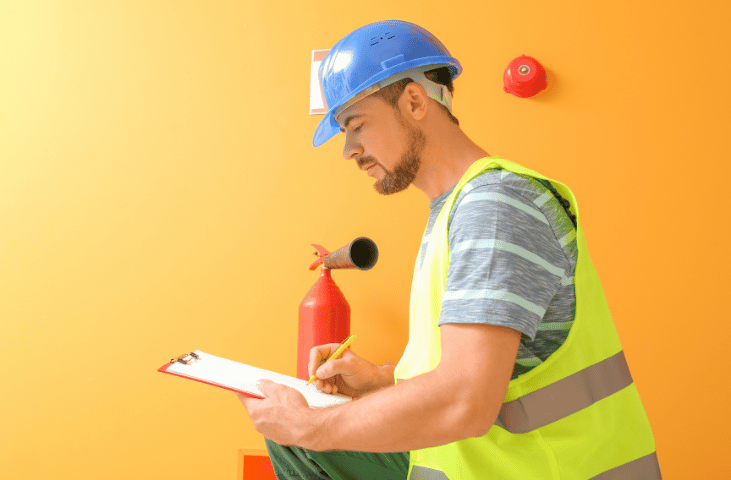 Man checking fire equipment.