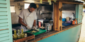 Man in a mobile food unit.